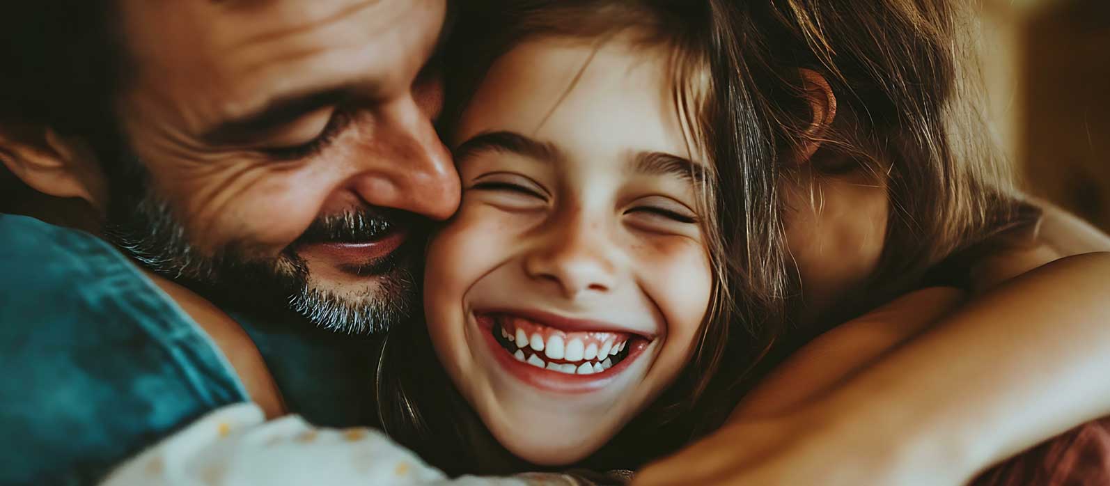 Father hugging daughter, reunited in Miami, Florida, after successful immigration with help from a Green Card Lawyer in Coral Gables.